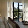 bedroom with views of nearby neighborhood areas